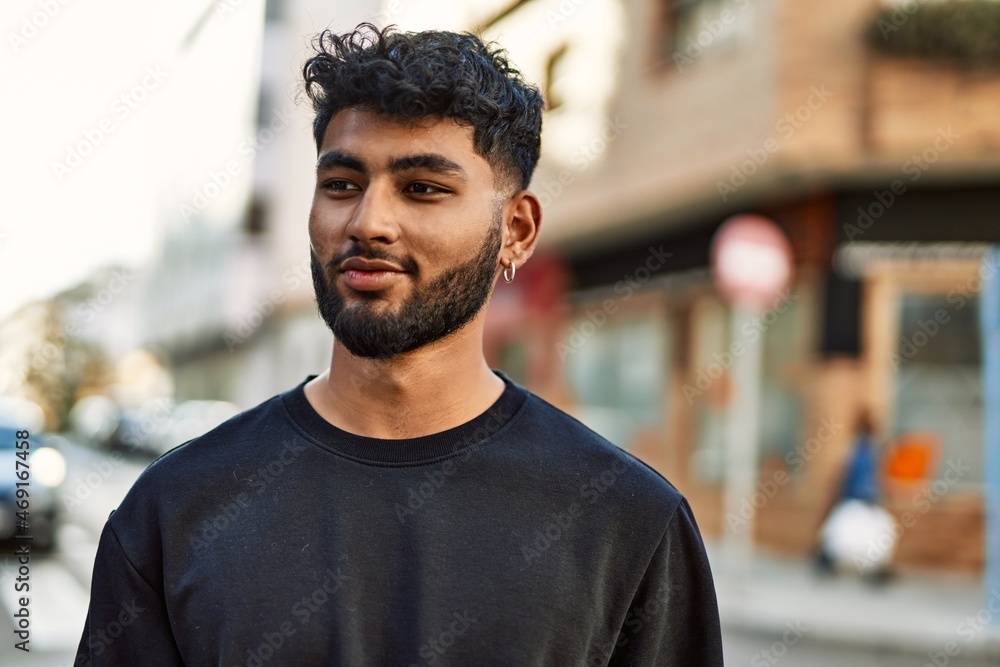 Young arab man smiling confident at street Young arab man smiling confident at street