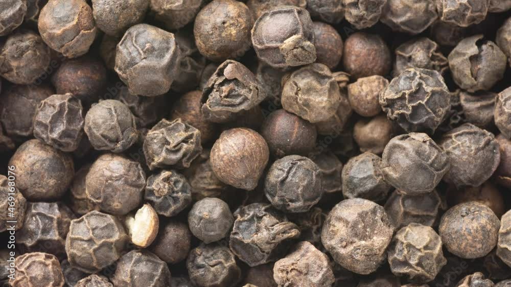 Rotating top closeup view of black pepper Rotating top closeup view of black pepper