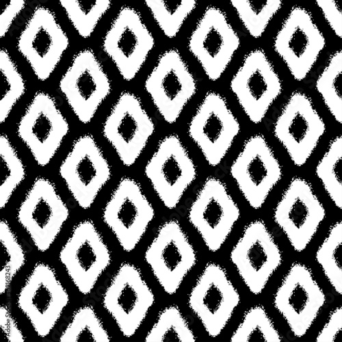 White ink rhombuses isolated on black background. Monochrome geometric seamless pattern. Vector simple flat graphic hand drawn illustration. Texture.