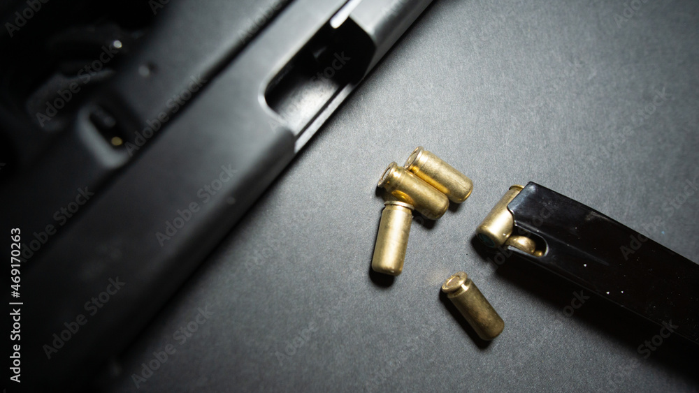 gun and bullets gun and bullets