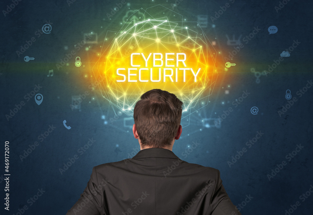 Rear view of a businessman, online security concept Rear view of a businessman, online security concept