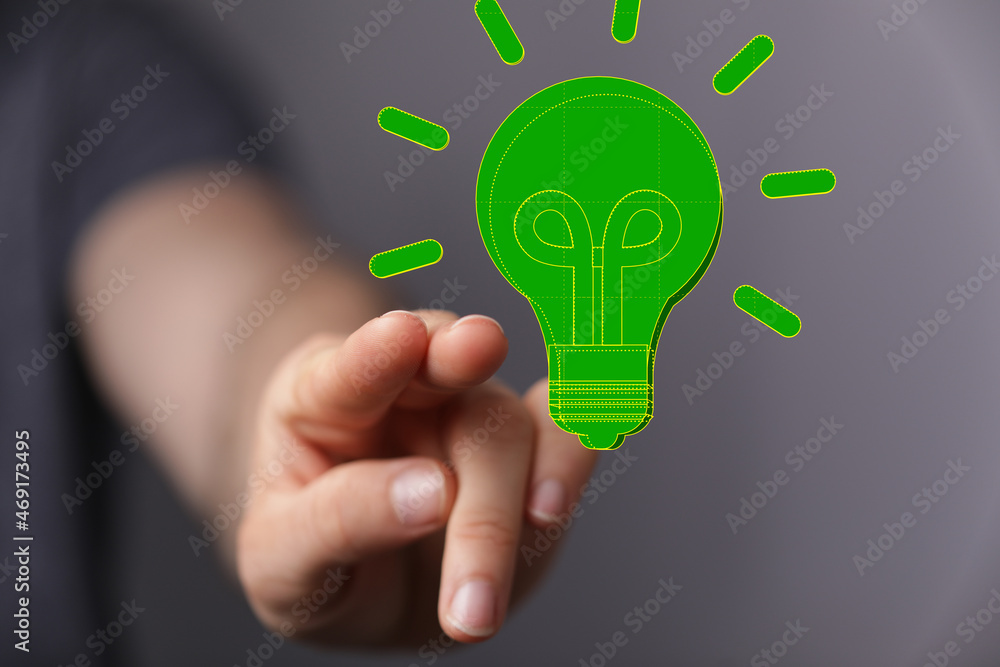 hand holding eco light bulb energy concept hand holding eco light bulb energy concept