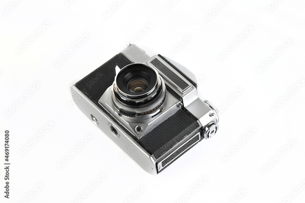 MOSCOW, RUSSIA, NOVEMBER 14, 2021. Very rare old Soviet 35 mm SLR camera Zenit-4, released 1967 on white background. MOSCOW, RUSSIA, NOVEMBER 14, 2021. Very rare old Soviet 35 mm SLR camera Zenit-4, released 1967 on white background.