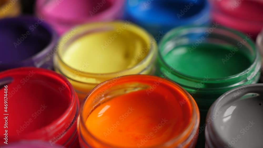 Set Gouache Paints in Jars Bright Color Close Up. Rotation Set of Multicolor Gouache on Plastic Jars. Rotation Multicolor Background. Background of Multi Colored Paint. Creative Drawing Art Hobby. Set Gouache Paints in Jars Bright Color Close Up. Rotation Set of Multicolor Gouache on Plastic Jars. Rotation Multicolor Background. Background of Multi Colored Paint. Creative Drawing Art Hobby.
