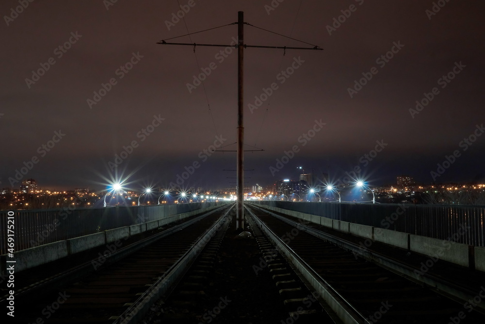 Old tram tracks on the North Bridge in Voronezh on an autumn evening