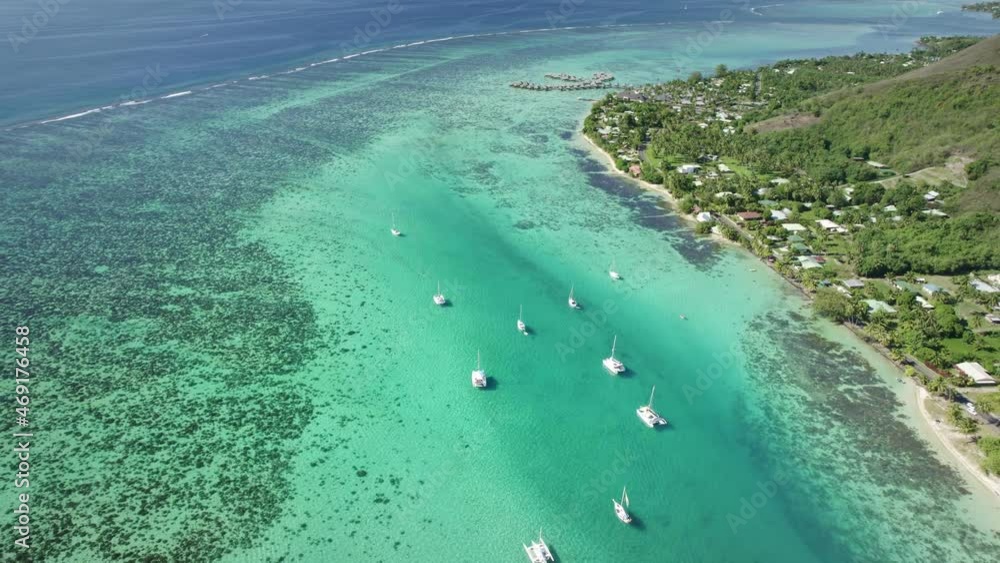 Drone aerial Tahiti. Moorea coastal landscape, sailboats in ocean. Travel French Polynesia. Tropical paradise. Exotic vacation getaway, romantic honeymoon destination. Drone aerial Tahiti. Moorea coastal landscape, sailboats in ocean. Travel French Polynesia. Tropical paradise. Exotic vacation getaway, romantic honeymoon destination.