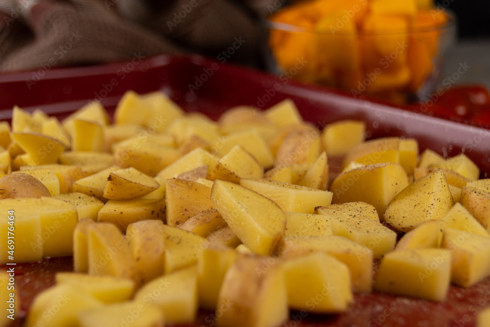 Cutting board with Chopped Potatoes in a Kitchen Cutting board with Chopped Potatoes in a Kitchen