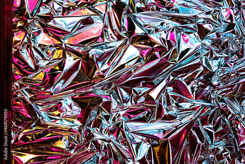 Modern beautiful holographic wrinkled foil background