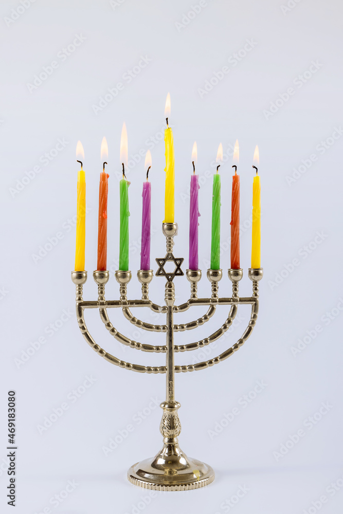 Jewish holiday hanukkah symbols menorah with copy space white background Jewish holiday hanukkah symbols menorah with copy space white background