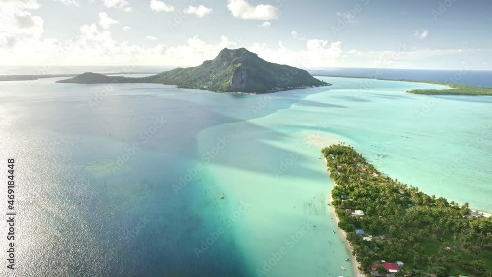 Aerial view Tahiti drone Maupiti island. blue lagoon of French Polynesia. Tropical paradise island. Exotic travel vacation getaway, romantic honeymoon destination.
Aerial view Tahiti drone Maupiti island. blue lagoon of French Polynesia. Tropical paradise island. Exotic travel vacation getaway, romantic honeymoon destination.