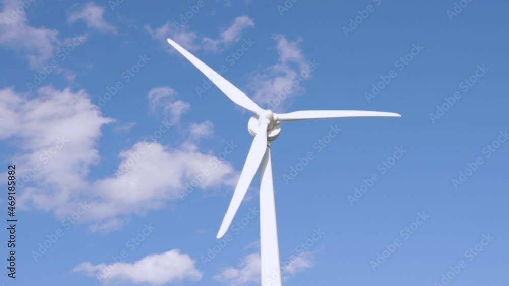 Wind power station with clear blue sky background. Wind turbine at downtown in Toronto, Canada Wind power station with clear blue sky background. Wind turbine at downtown in Toronto, Canada