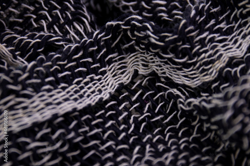 Black and White Handicraft Clothes on White Background . Close up Detail of Hand Woven Cotton Scarf , Design texture and Pattern by Artisans in Northern Villages of Thailand