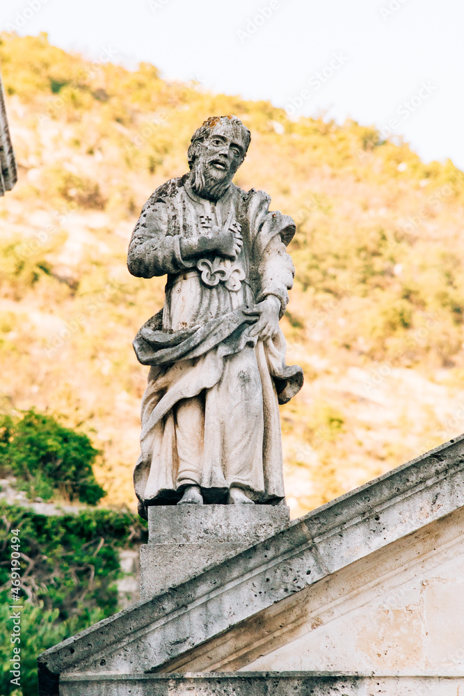 Statue near Catholic church of Saint apostle Mark. Perast. Montenegro