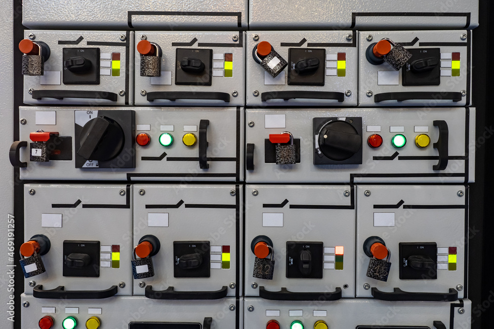 Substation control panel. Equipment for management of electrical networks. Fragment of control panel for distribution substation. Electrification equipment. Padlocked control panel on switches