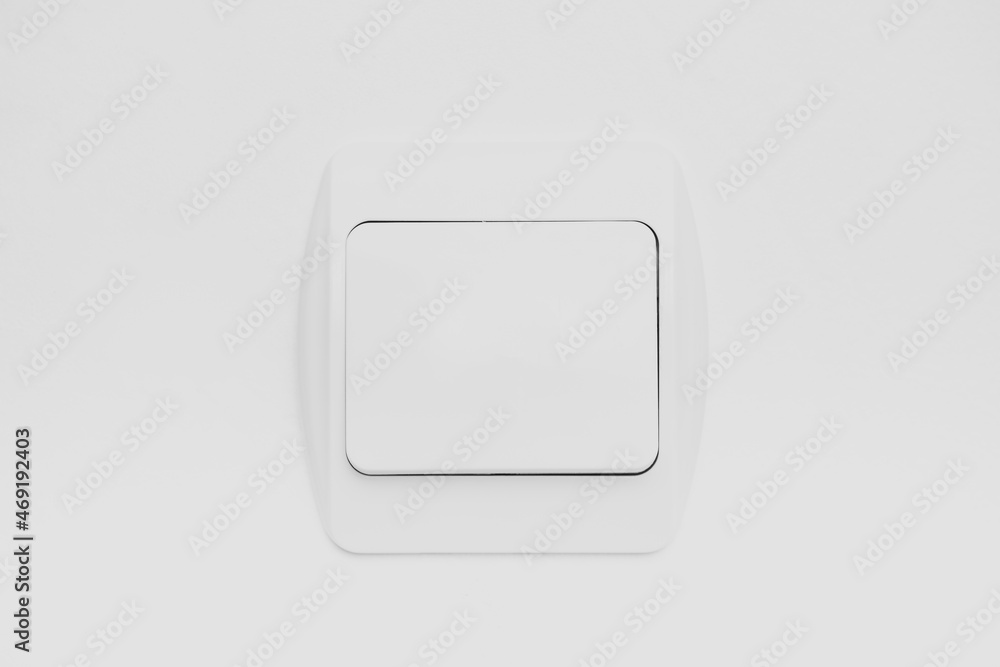 light switch on white background light switch on white background