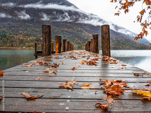 Wood pier on Lake Piano in autumn