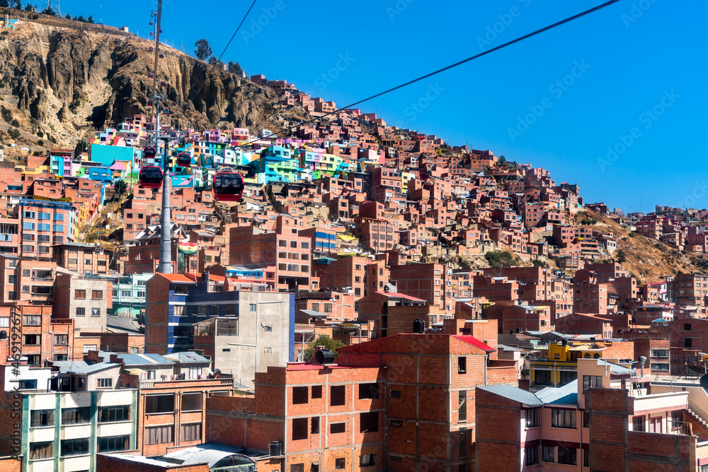 Cable car above the colorful Chualluma district of La Paz, Bolivia