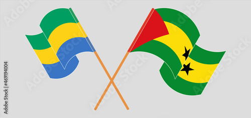 Crossed and waving flags of Gabon and Sao Tome and Principe