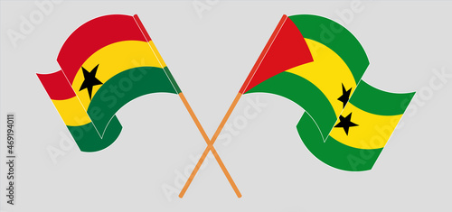 Crossed and waving flags of Ghana and Sao Tome and Principe