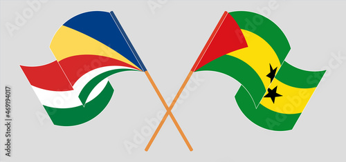 Crossed and waving flags of Seychelles and Sao Tome and Principe