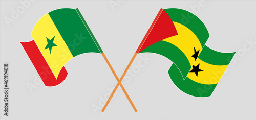 Crossed and waving flags of Senegal and Sao Tome and Principe