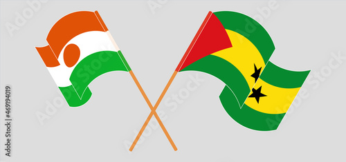 Crossed and waving flags of Niger and Sao Tome and Principe