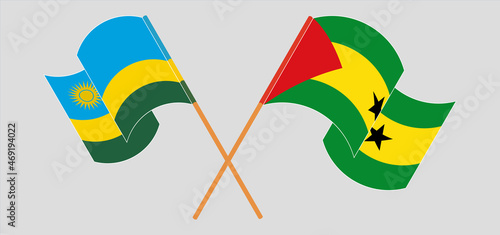 Crossed and waving flags of Rwanda and Sao Tome and Principe