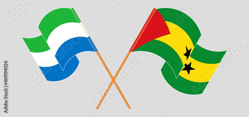 Crossed and waving flags of Sierra Leone and Sao Tome and Princip