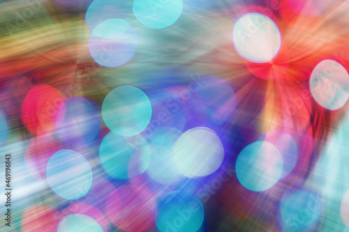 Abstract christmas background with colored light spots in bokeh
