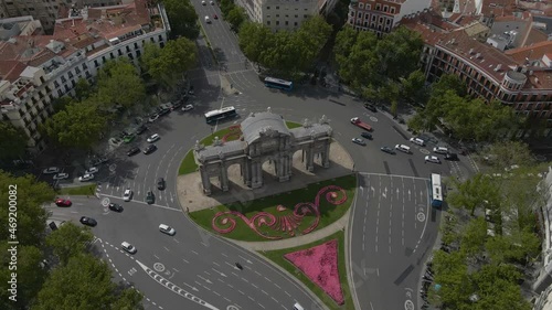 Aerial footage of the roundabout with La Puerta de Alcala in Madrid, Spain, 4k