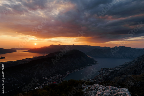 View from Mount Lovcen to the orange sunset sky over the bay. Montenegro