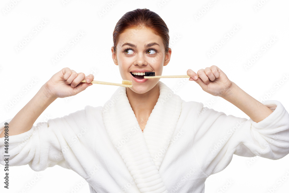 contact woman in white robe toothbrushes bathroom hygiene contact woman in white robe toothbrushes bathroom hygiene