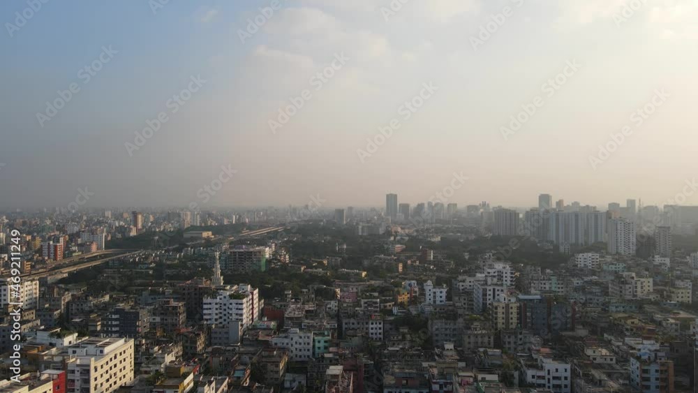 Descending drone shot with views of Dhaka's polluted skyline, Bangladesh Descending drone shot with views of Dhaka's polluted skyline, Bangladesh