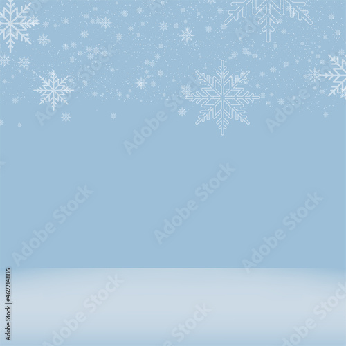 Christmas or Happy New Year background with snowing snowlakes on blue. Vector
