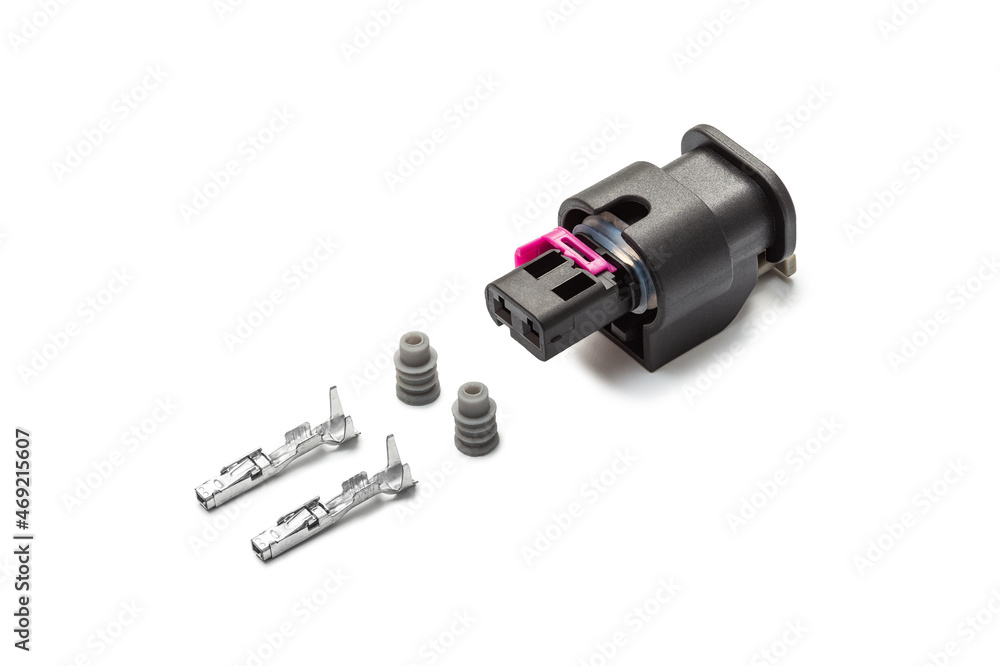Connector for wiring. Spare part of the engine electrical system. Contact electrical connector isolated on white background