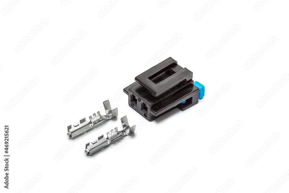 Connector for wiring. Spare part of the engine electrical system. Contact electrical connector isolated on white background Connector for wiring. Spare part of the engine electrical system. Contact electrical connector isolated on white background