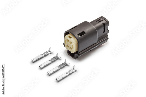 Obraz na płótnie Connector for wiring. Spare part of the engine electrical system. Contact electrical connector isolated on white background w salonie