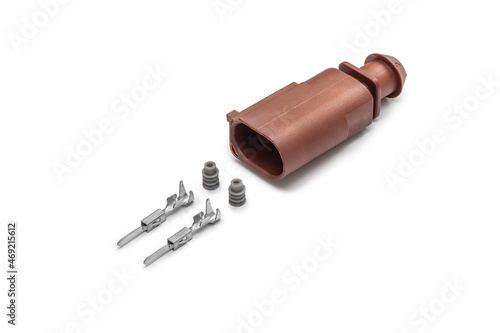 Connector for wiring. Spare part of the engine electrical system. Contact electrical connector isolated on white background