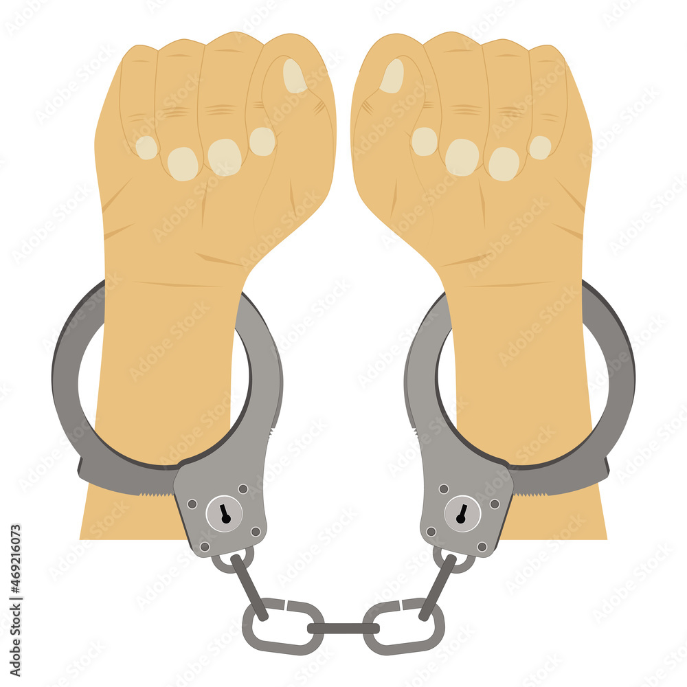 Hands in handcuffs. Hands in handcuffs.