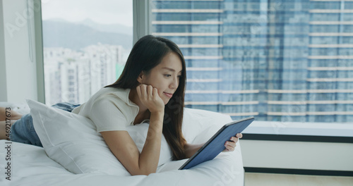 Woman look at the tablet computer Free Download Woman look at the tablet computer - GFXLoad