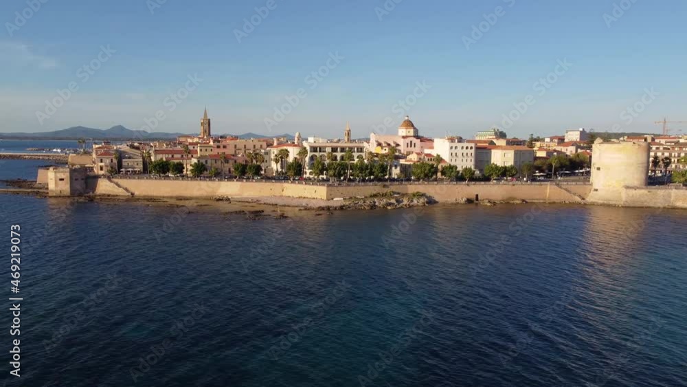 Aerial view of the ancient city walls on the coast of Alghero in Italy Aerial view of the ancient city walls on the coast of Alghero in Italy