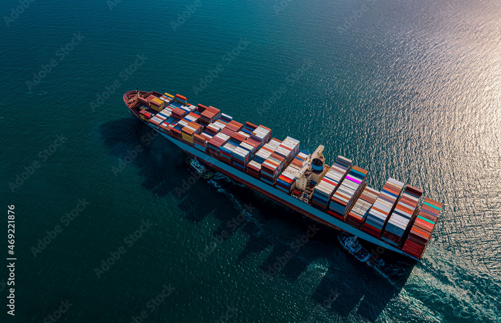 Fototapeta premium The Aerial view ship of business Logistics and transportation with International Container Cargo ship and import export oversea image