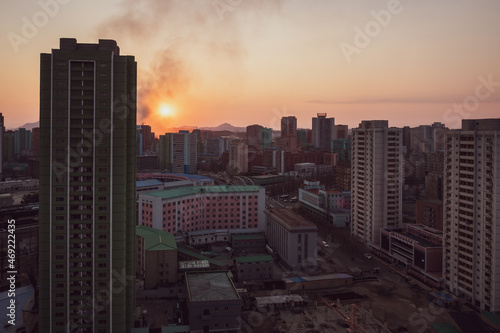Sunset among buildings in Pyongyang  North Korea