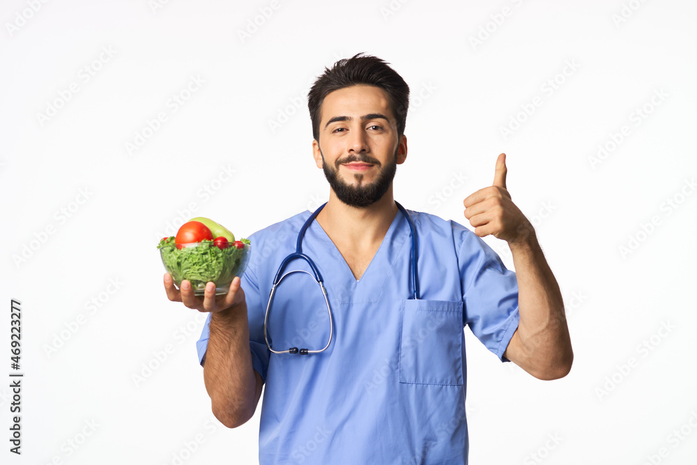 male doctor plate with vegetables healthy food nutritionist male doctor plate with vegetables healthy food nutritionist