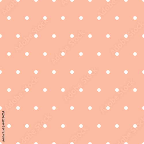 Seamless pattern. Pink background with white dots . Vector illustration.