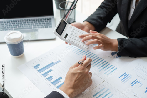 Business leaders talk about charts, financial graphs showing results are analyzing and calculating planning strategies, business success building processes