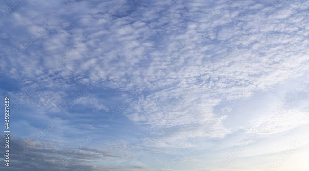 Beautiful view of sky with clouds at sunrise. Partly cloudy. Colorful sunset. Natural sky background texture, beautiful color. Beautiful view of sky with clouds at sunrise. Partly cloudy. Colorful sunset. Natural sky background texture, beautiful color.