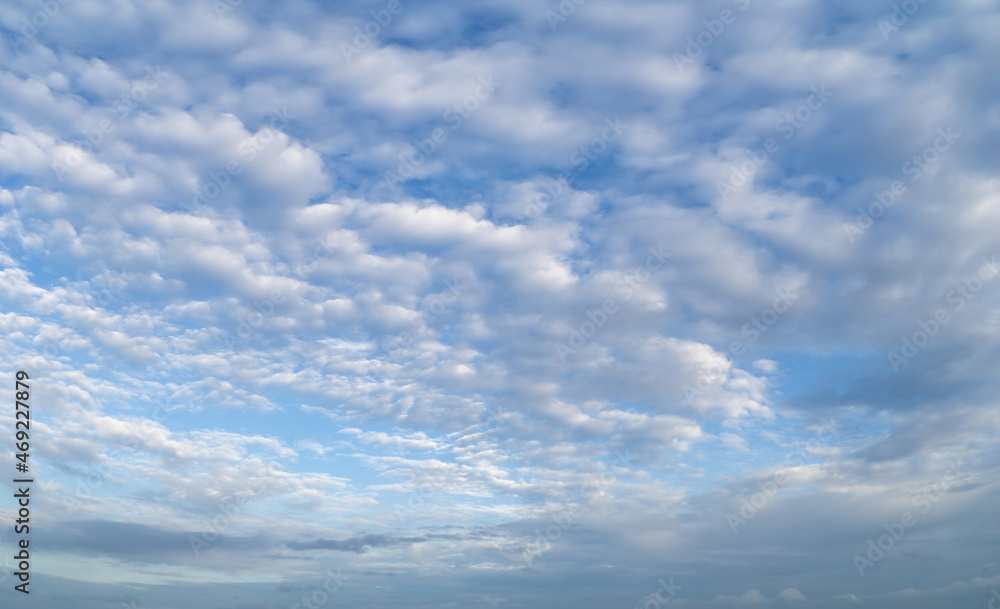 Beautiful view of sky with clouds at sunrise. Partly cloudy. Colorful sunset. Natural sky background texture, beautiful color.