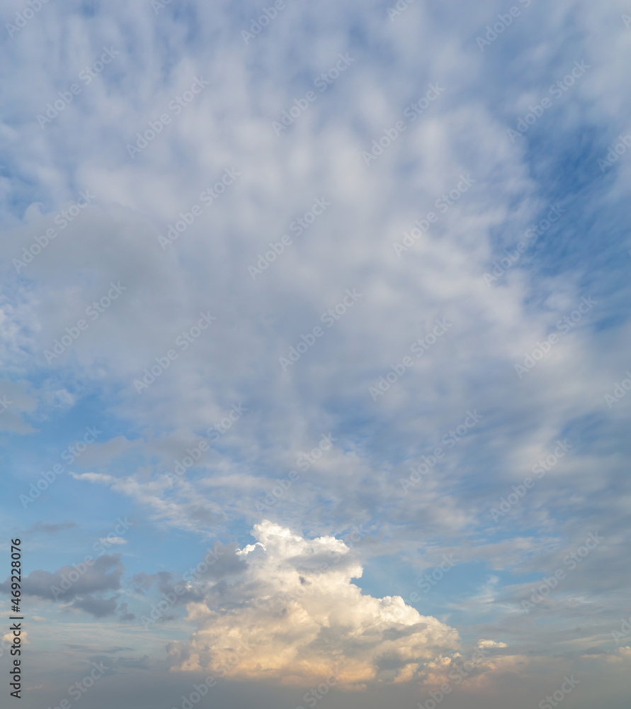 Obraz premium Beautiful view of sky with clouds at sunrise. Partly cloudy. Colorful sunset. Natural sky background texture, beautiful color.