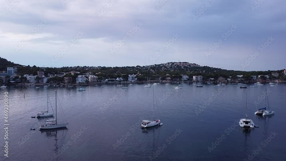 Here is a drone shot captured on a cloudy morning at the beautiful beach in Santa Ponsa, Balearic Islands, Majorca. Here is a drone shot captured on a cloudy morning at the beautiful beach in Santa Ponsa, Balearic Islands, Majorca.